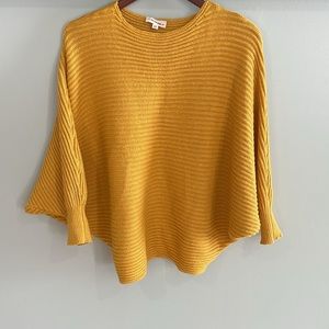 ERSOME POINTELLE DOLMAN SLEEVE
KNIT SWEATER. SIZE S/M.